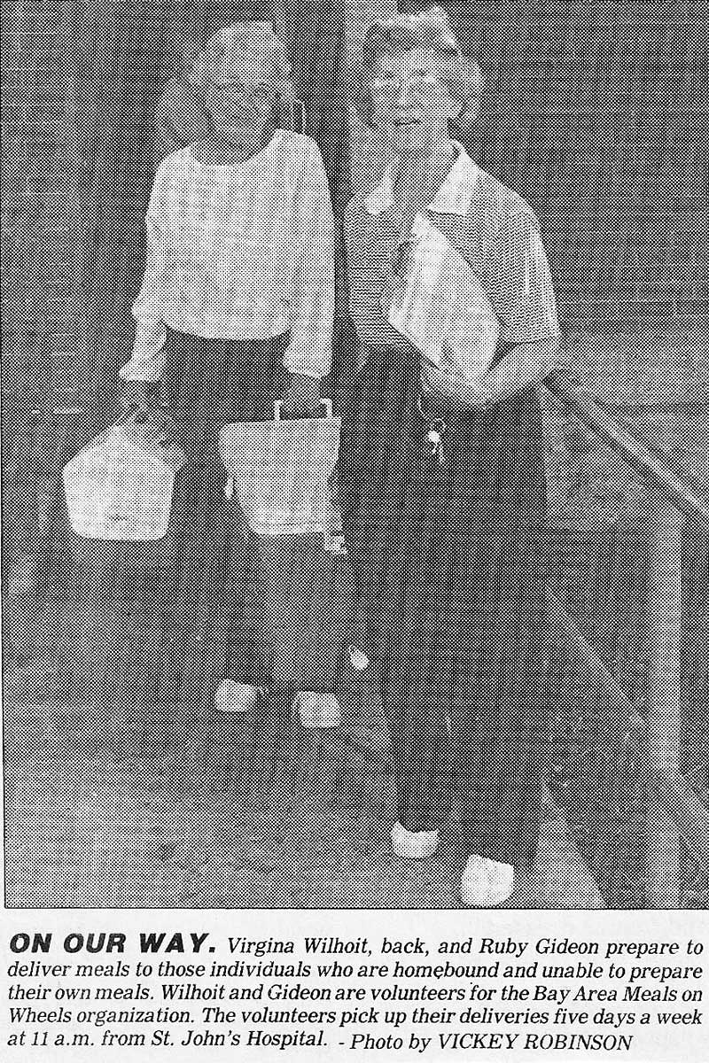 BAMOW volunteer drivers preparing for meal deliveries, 1988
