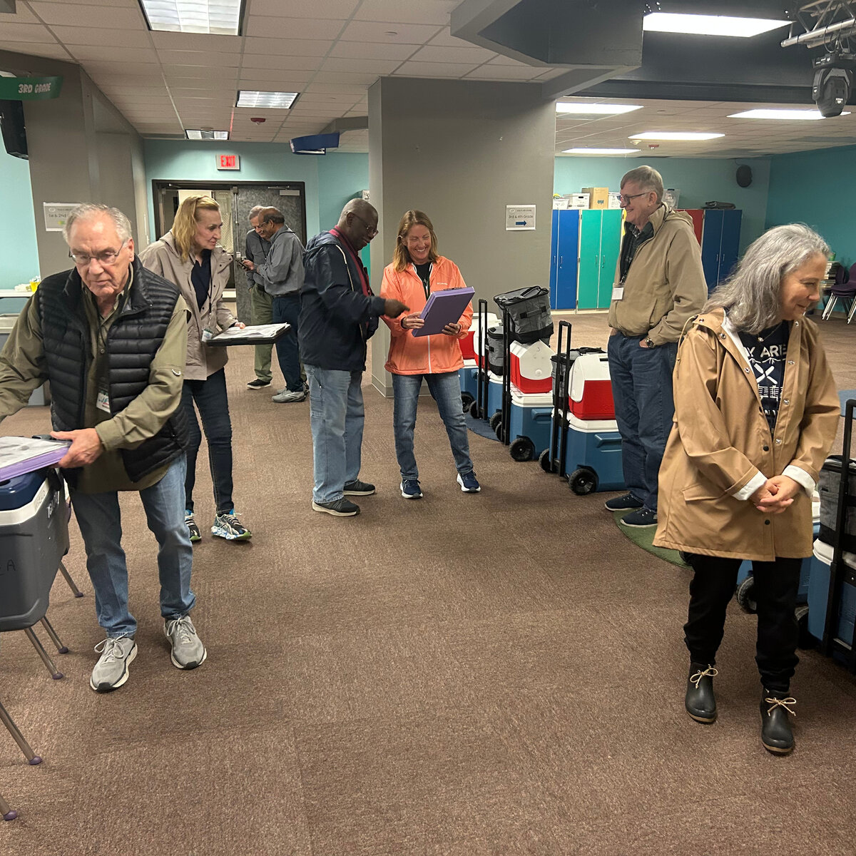 BAMOW volunteers preparing meal bags before a delivery route