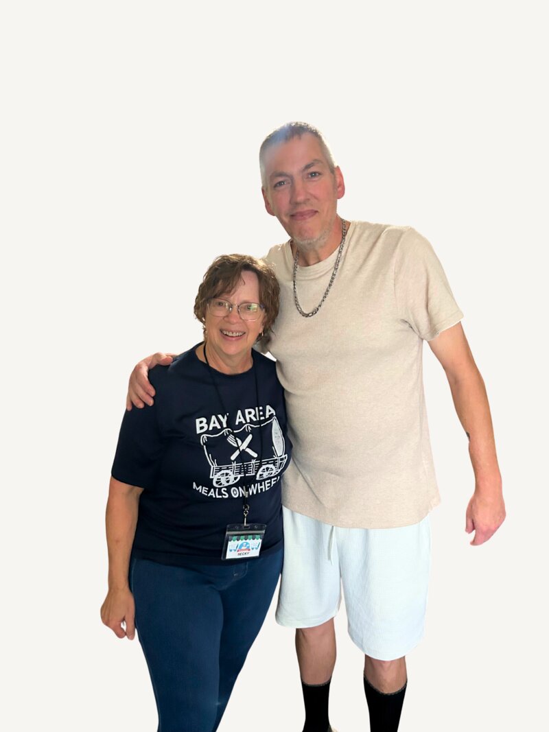 Shaun Springer with a Bay Area Meals on Wheels volunteer